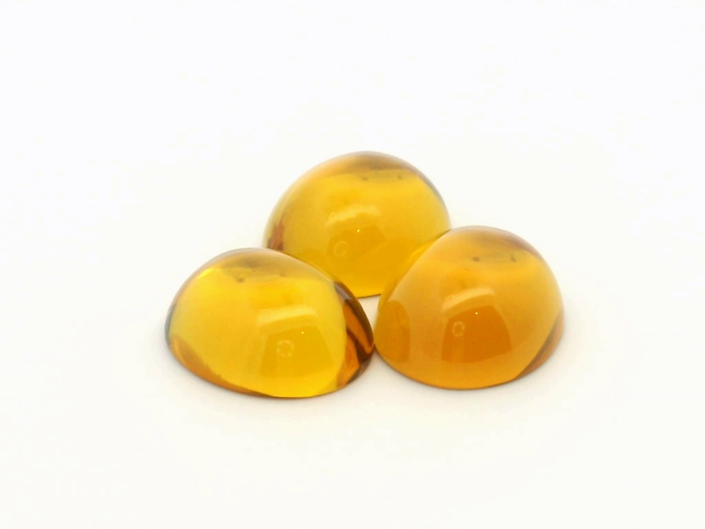 Synthetic Sapphire 14x12mm Oval Cabochon German Cut Yellow