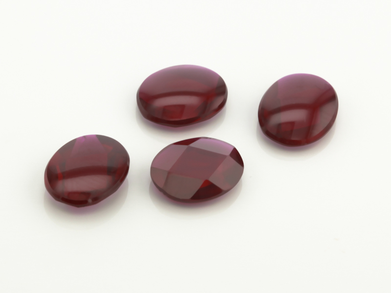 Synthetic Ruby 10x8mm Oval Buff Top Deep Pavillion Dark Red