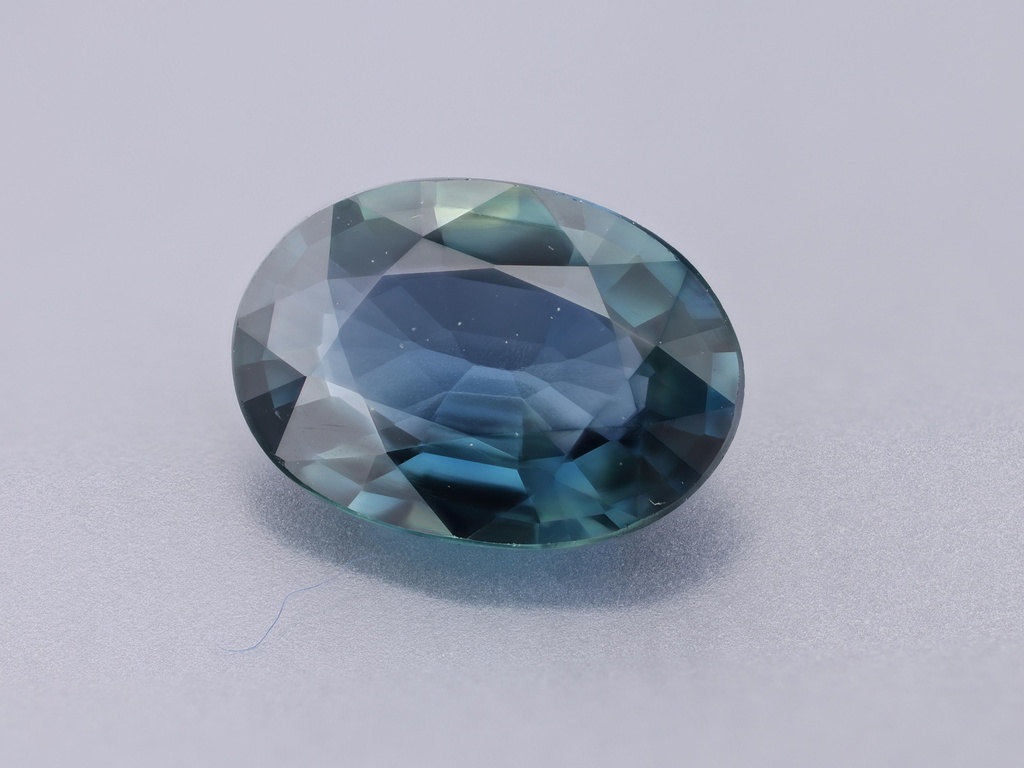 Teal Sapphire 6.9x4.9mm Oval